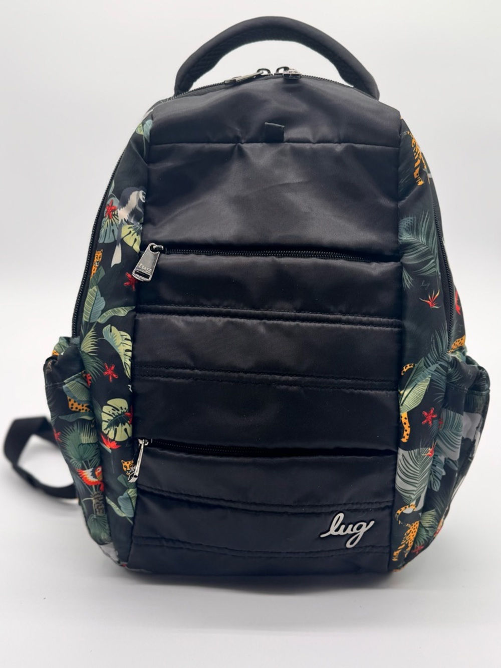 Lug Black Backpack with Tropical Leaf Accents